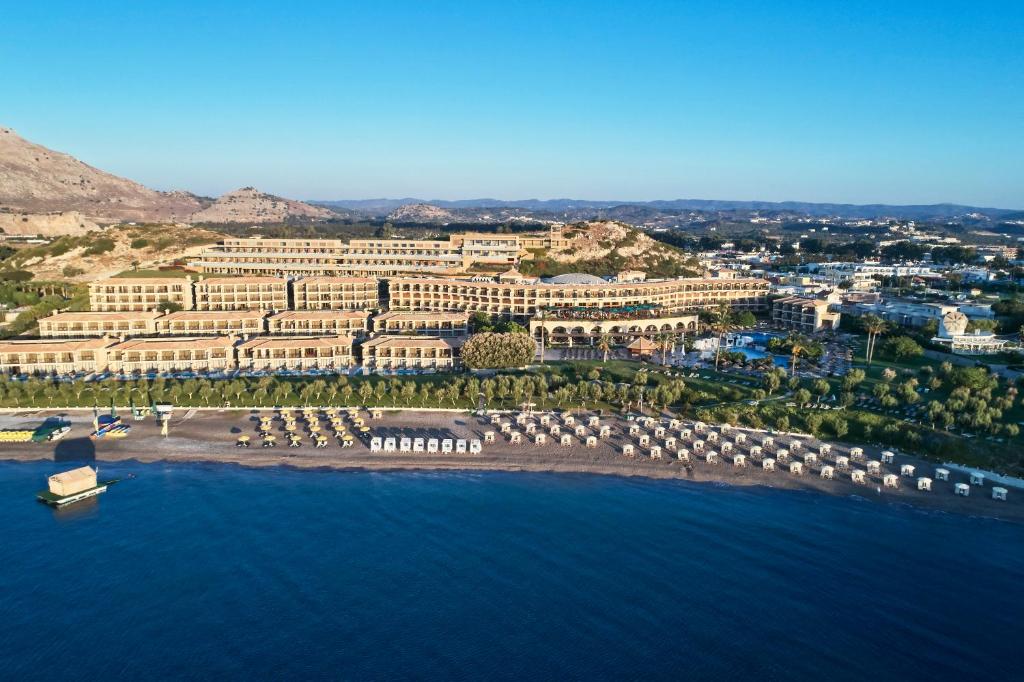 an aerial view of a resort on the water at Atlantica Imperial Resort - Adults Only in Kolymbia