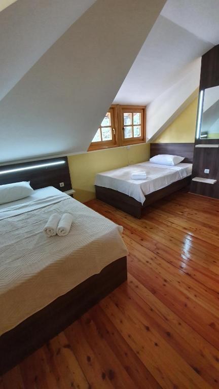 En eller flere senge i et værelse på Vila Panić Zlatibor