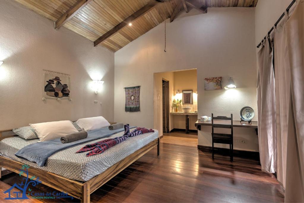 Postel nebo postele na pokoji v ubytování Casa Koda Beach Front