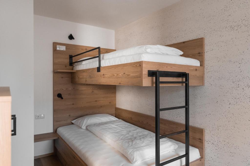 Postel nebo postele na pokoji v ubytování Hotel Gasthof Jochele