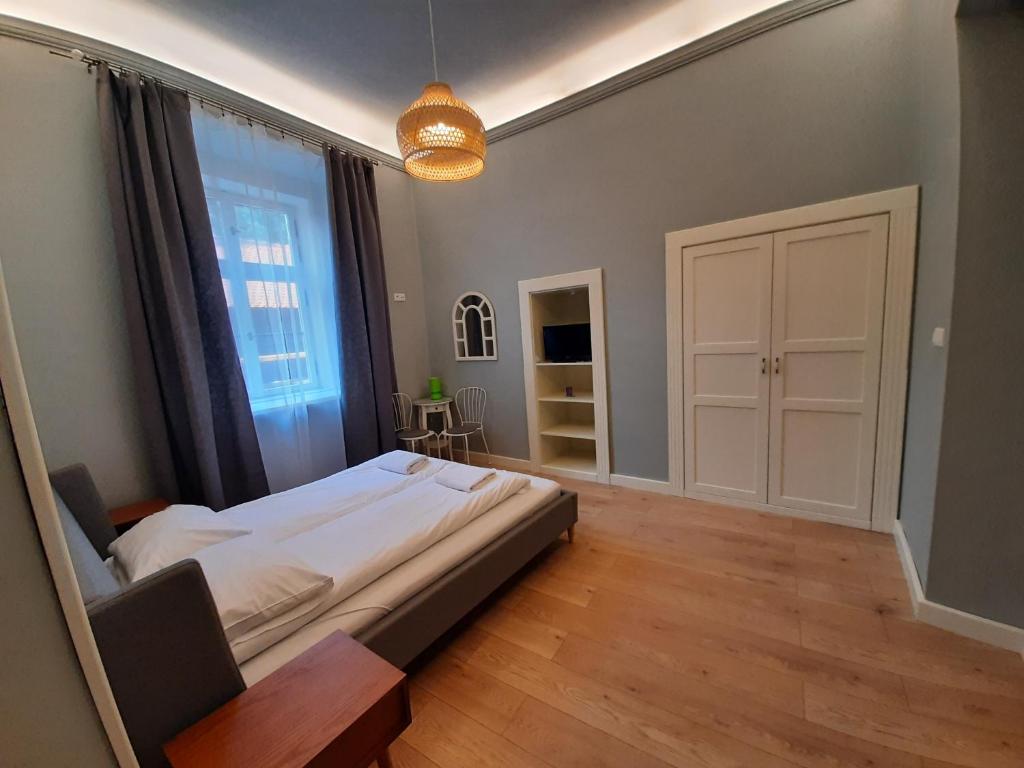 Posteľ alebo postele v izbe v ubytovaní Florianska Gate Luxury Apartments