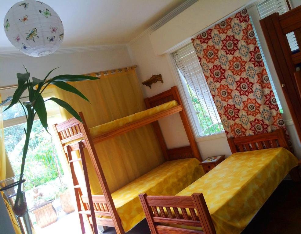 Postel nebo postele na pokoji v ubytování Zen Hotel Brasil