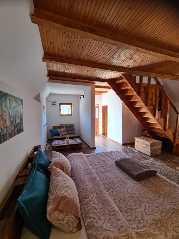 Postel nebo postele na pokoji v ubytování Eco Village Nevidio