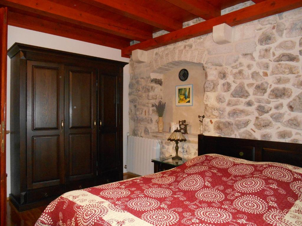 Posteľ alebo postele v izbe v ubytovaní Old stone house