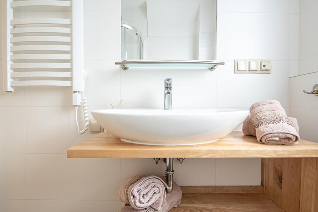 Koupelna v ubytování Osada LUX-HOUSE & SAUNA