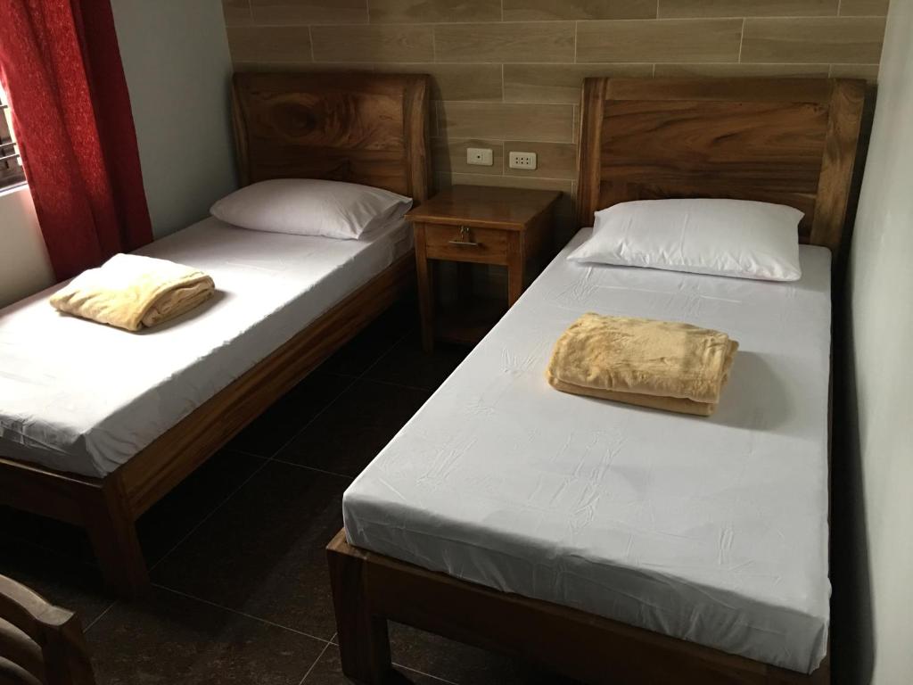 Postel nebo postele na pokoji v ubytování Lucena Fresh Air Hotel