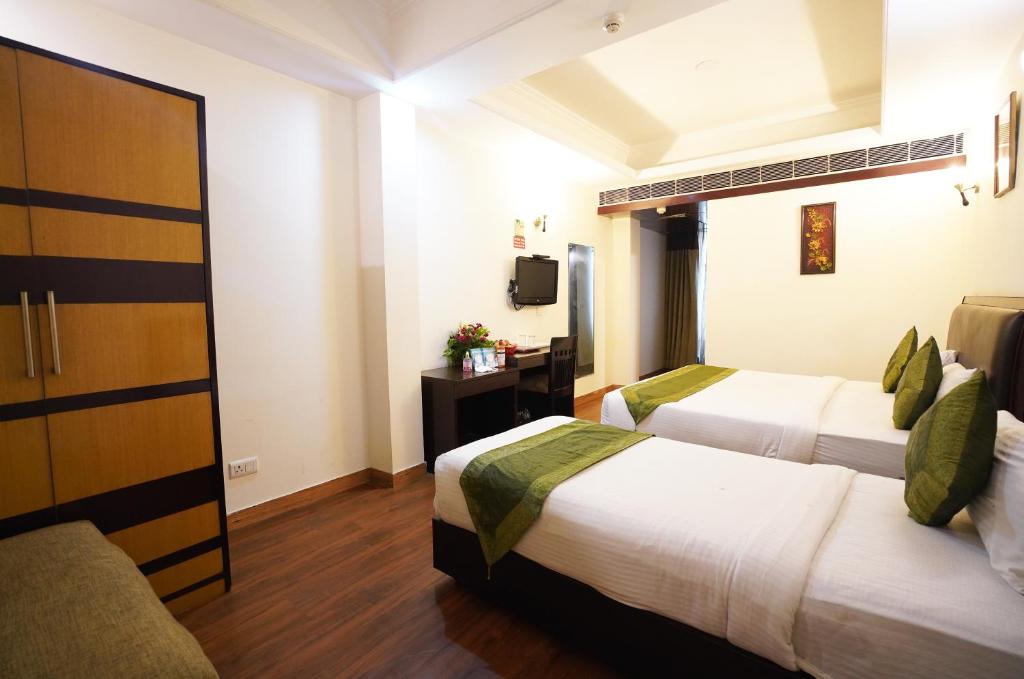 Postel nebo postele na pokoji v ubytování Airport Hotel Grand by Fantasia
