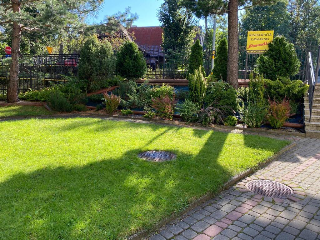 Vonkajšia záhrada v ubytovaní Apartament Rodzinny Centrum Zakopane