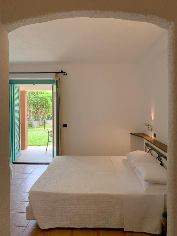 Postel nebo postele na pokoji v ubytování Park Hotel Asinara