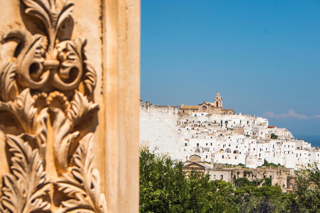 a view of the city from a building at OSTUNI PALACE - Hotel Bistrot & SPA in Ostuni