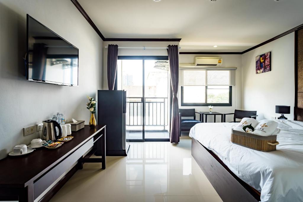 Postel nebo postele na pokoji v ubytování Lux Boutique Hotel