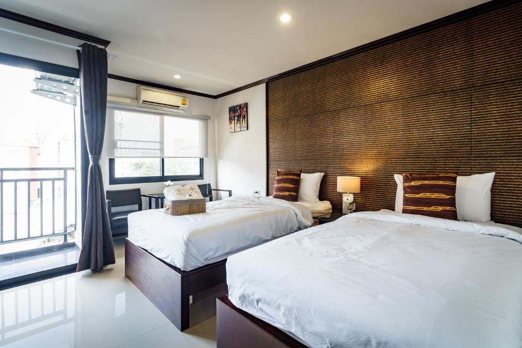 Postel nebo postele na pokoji v ubytování Lux Boutique Hotel