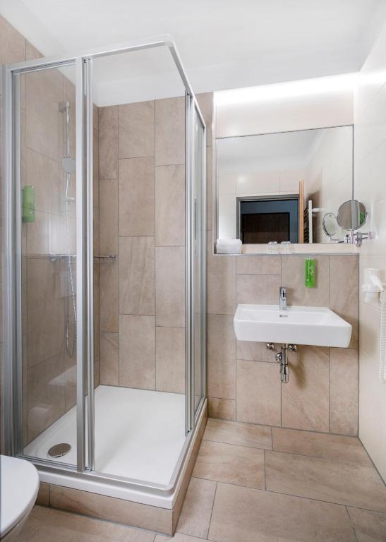 Koupelna v ubytování JUFA Hotel Mariazell