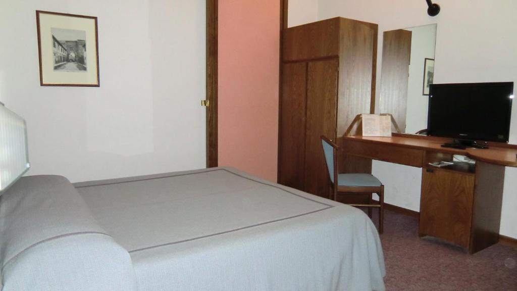 TV a/nebo společenská místnost v ubytování Hotel Giardino