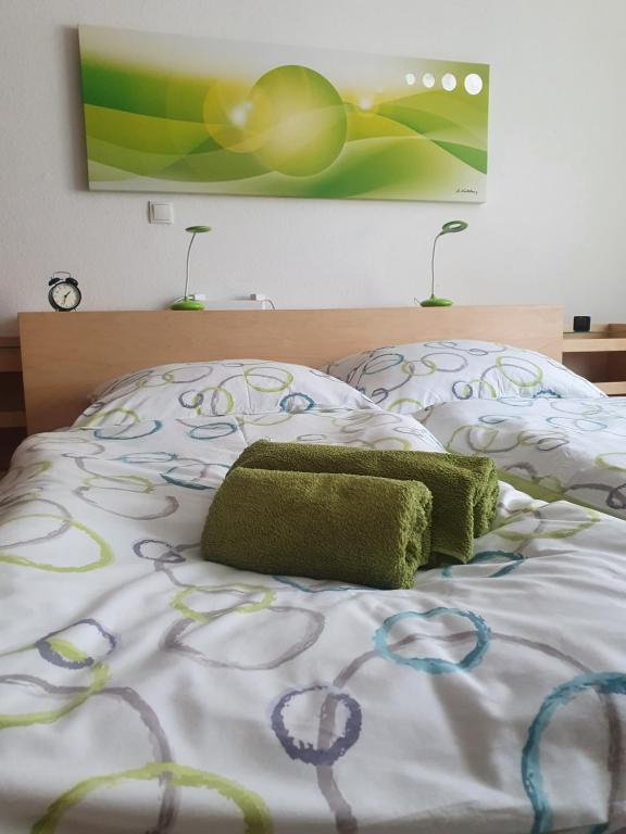 
Ein Bett oder Betten in einem Zimmer der Unterkunft Appartment Weingut Hess
