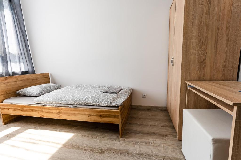 Posteľ alebo postele v izbe v ubytovaní Hostel Północna 61