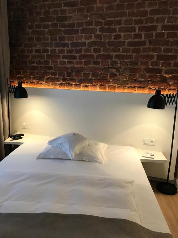 Postel nebo postele na pokoji v ubytování Hotel Lindenhof
