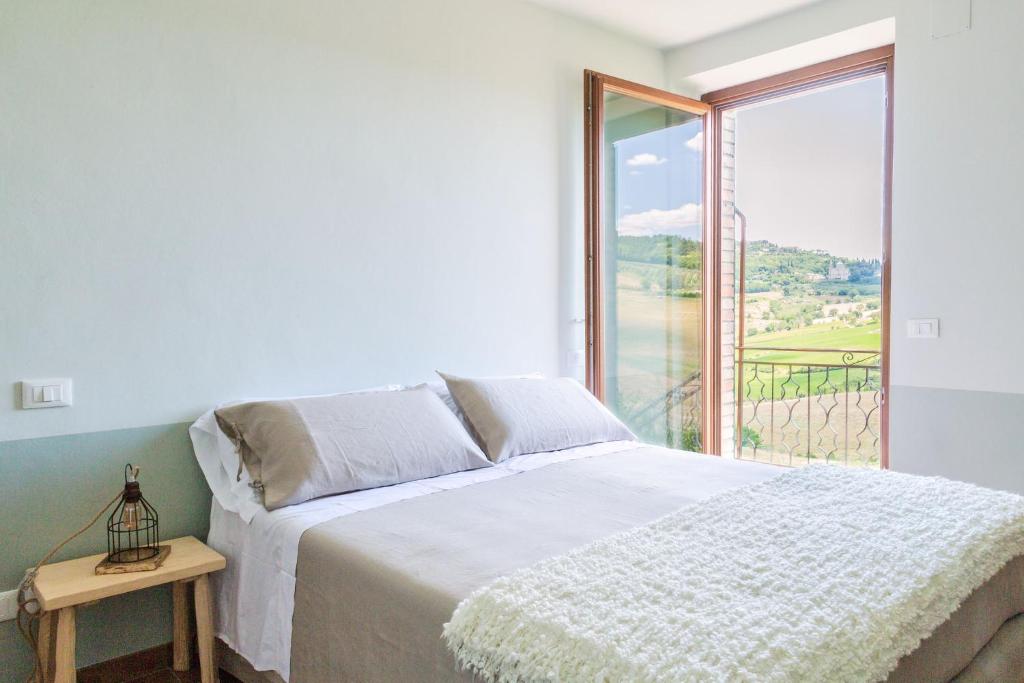 Postel nebo postele na pokoji v ubytování CUGUSI BnB