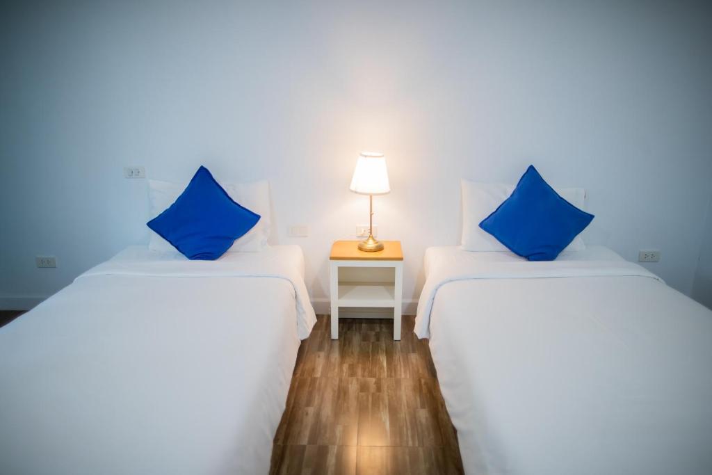 Postel nebo postele na pokoji v ubytování Blue Shore Cottage