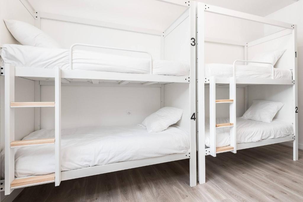 Postel nebo postele na pokoji v ubytování Le Couvent - Hostel
