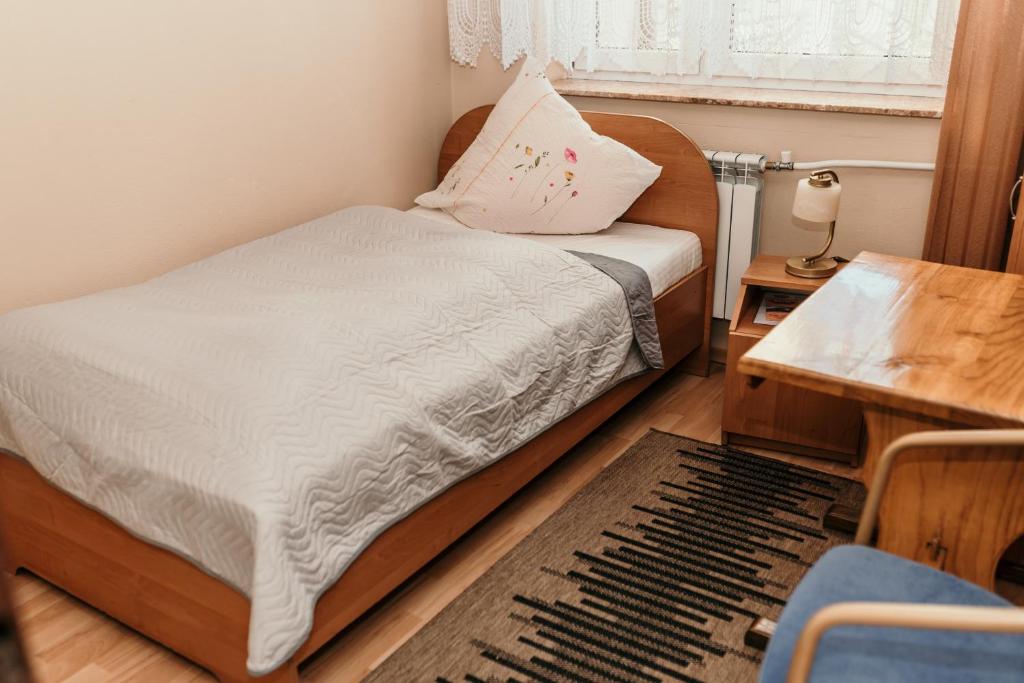 Postel nebo postele na pokoji v ubytování Motel Łasuch