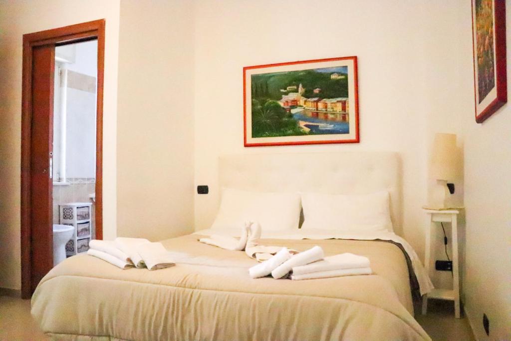 Postel nebo postele na pokoji v ubytování Villa Aurora B&B