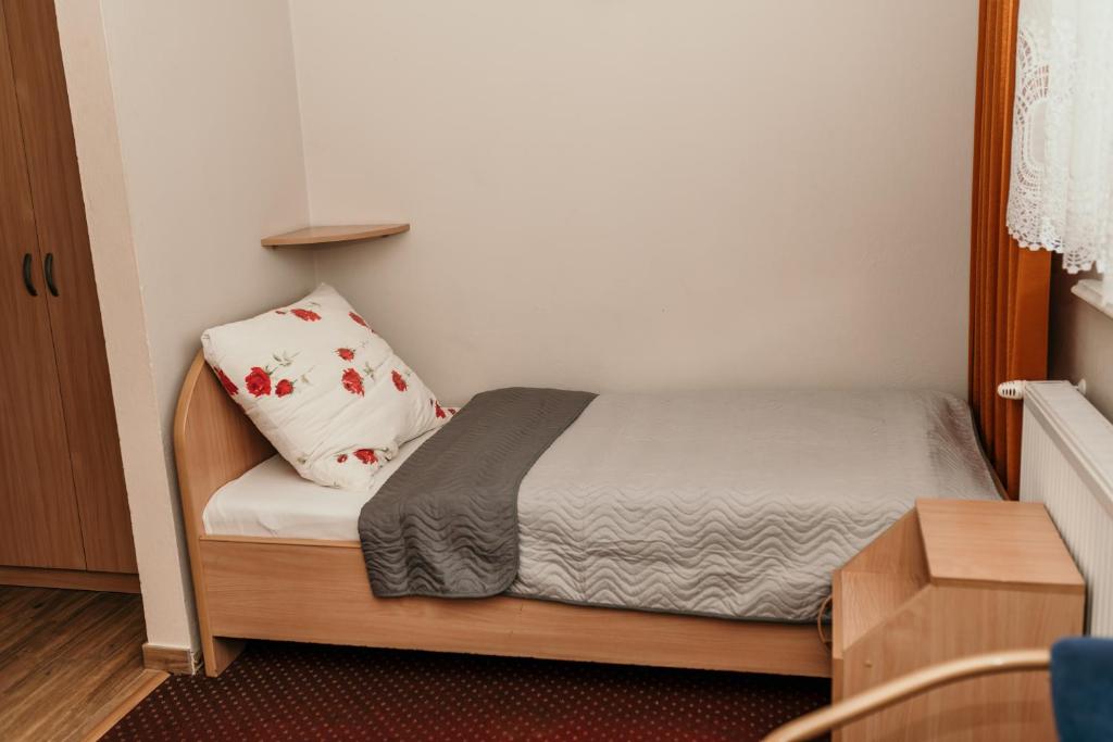 Postel nebo postele na pokoji v ubytování Motel Łasuch
