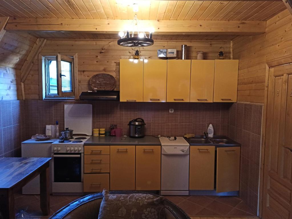 Kuchyň nebo kuchyňský kout v ubytování Romantika