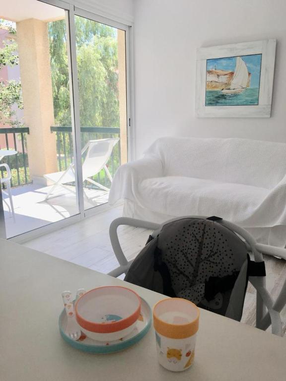 Ein Sitzbereich in der Unterkunft Apartment BEACH & RELAX