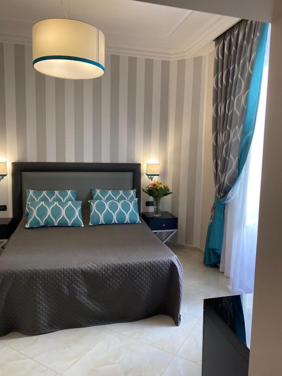 Postel nebo postele na pokoji v ubytování Hotel Contilia