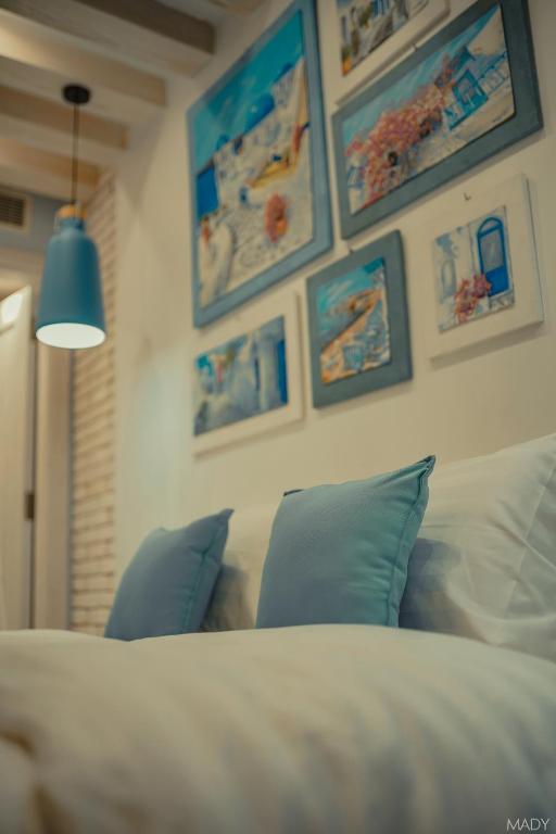 Postel nebo postele na pokoji v ubytování Miramar Boutique Hotel