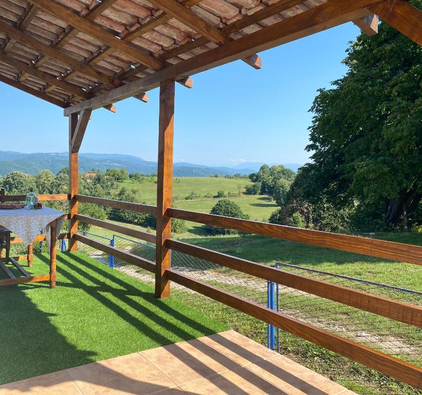 a view from the deck of a house with a fence at Vila Novaković in Kladovo