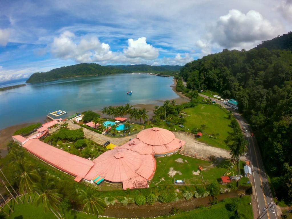 an aerial view of a park next to a lake at Hotel Samoa del Sur in Golfito