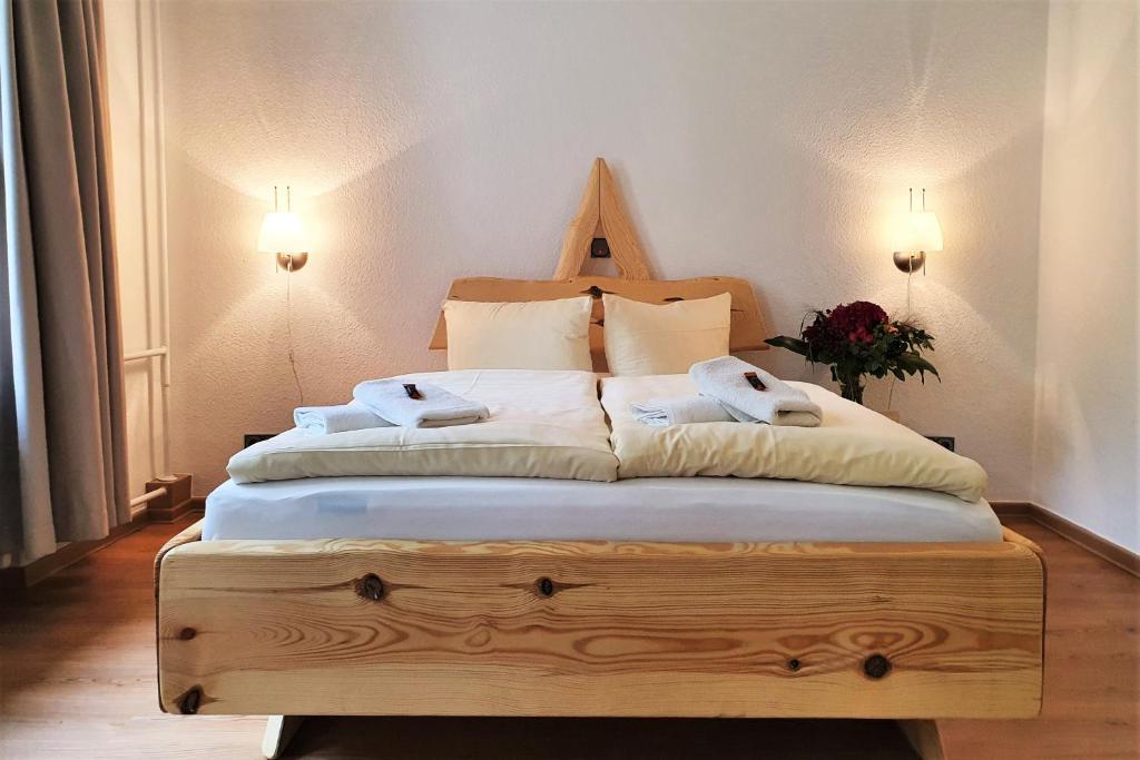 Postel nebo postele na pokoji v ubytování Waldhotel am See Berlin-Schmöckwitz