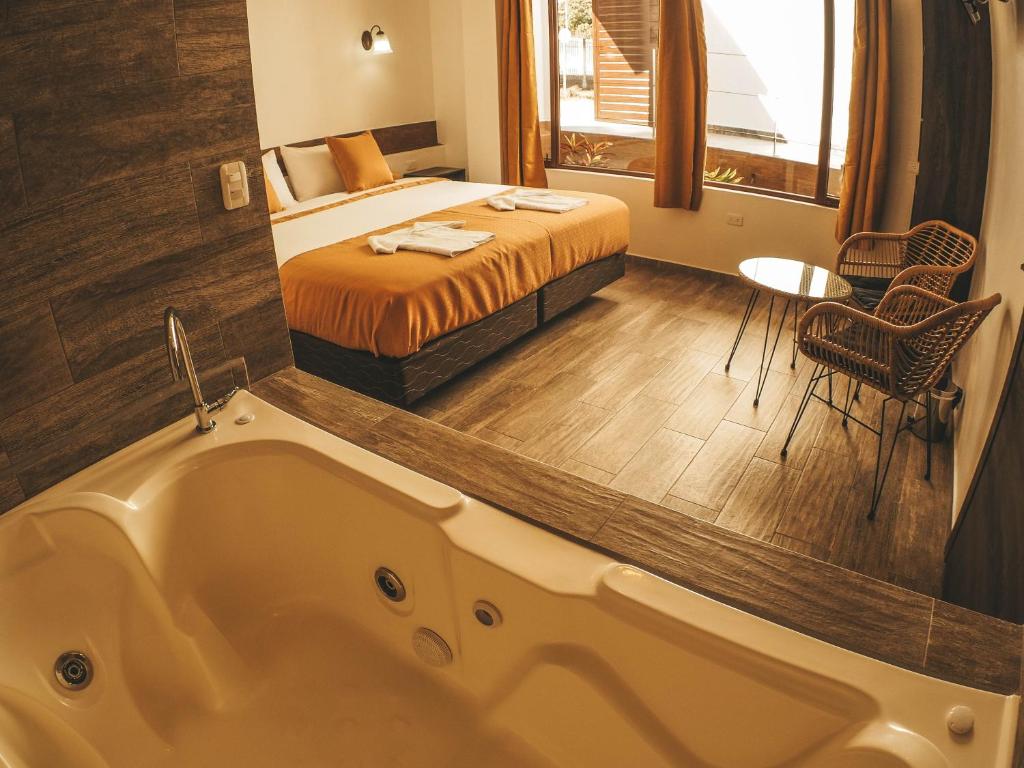 Postel nebo postele na pokoji v ubytování Toucan Platinum Suites Aparthotel
