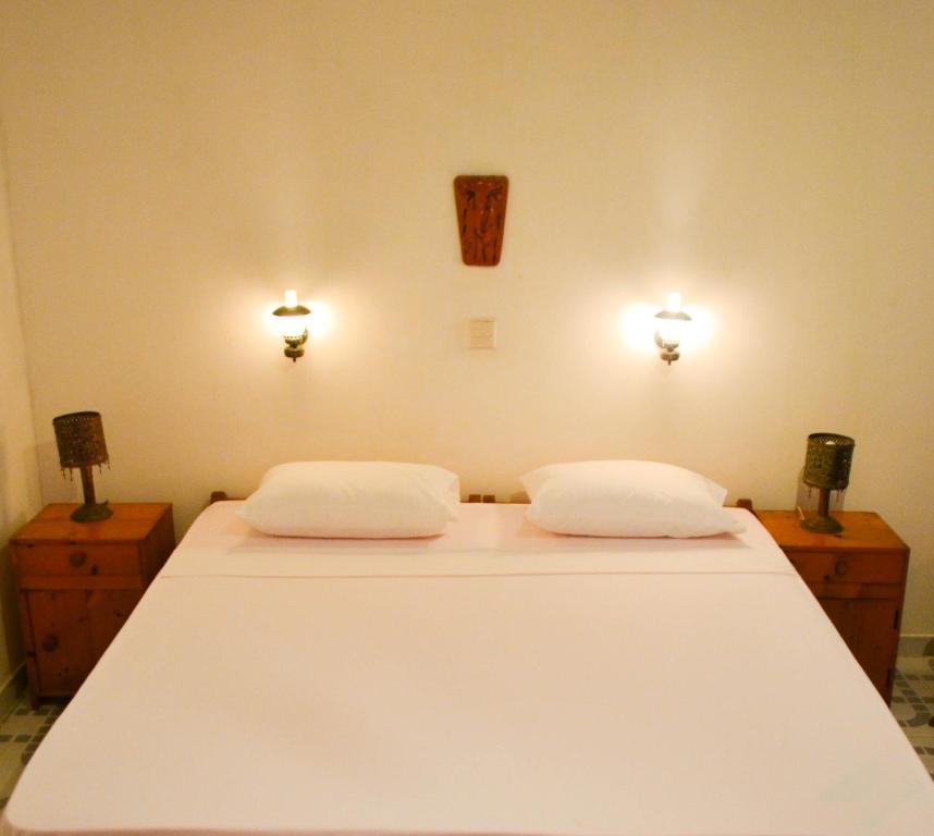 Postel nebo postele na pokoji v ubytování Hotel Thai Lanka