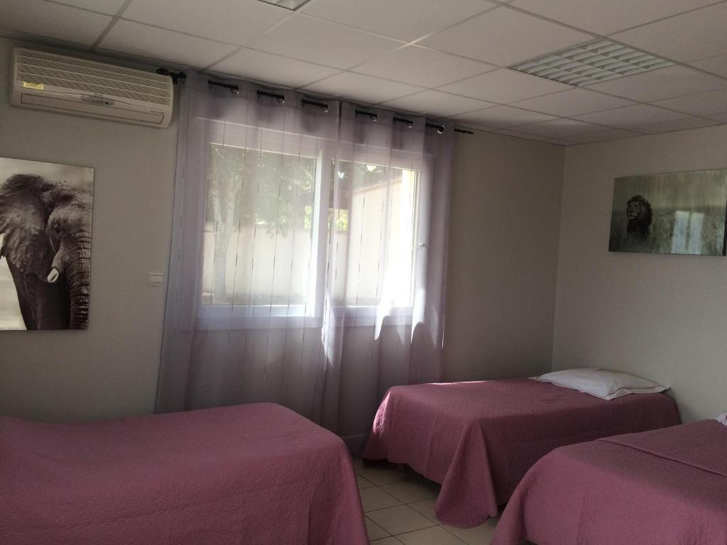 Ένα ή περισσότερα κρεβάτια σε δωμάτιο στο Maison cozy
