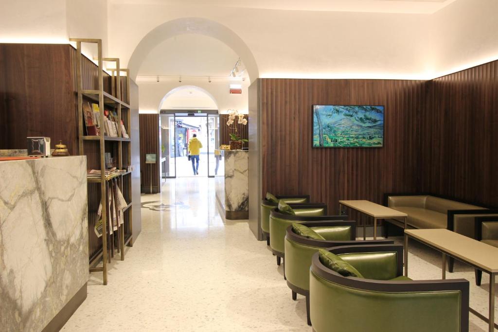 TV a/nebo společenská místnost v ubytování Hotel Fenice