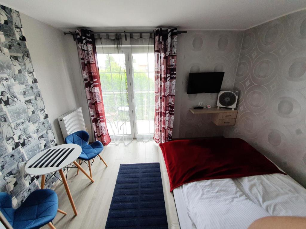 Posteľ alebo postele v izbe v ubytovaní Paradise