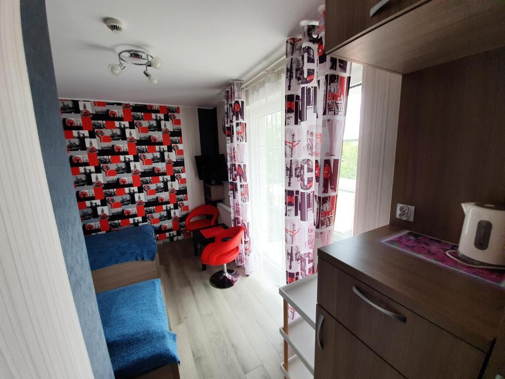 Kuchyňa alebo kuchynka v ubytovaní Paradise