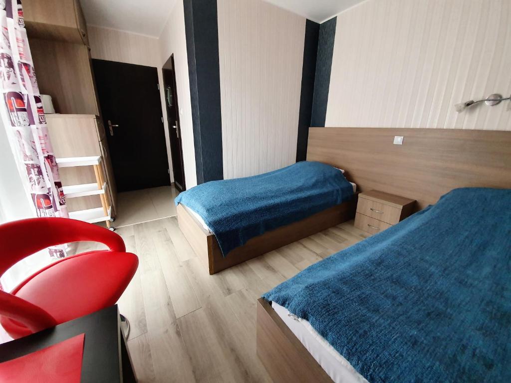 Posteľ alebo postele v izbe v ubytovaní Paradise