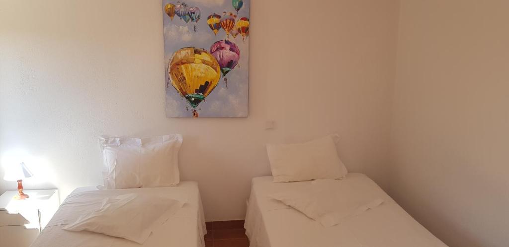 Uma cama ou camas num quarto em Casa Dr. Saba