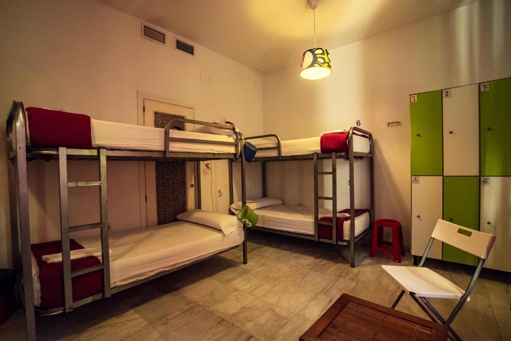Postel nebo postele na pokoji v ubytování La Flamenka Hostel