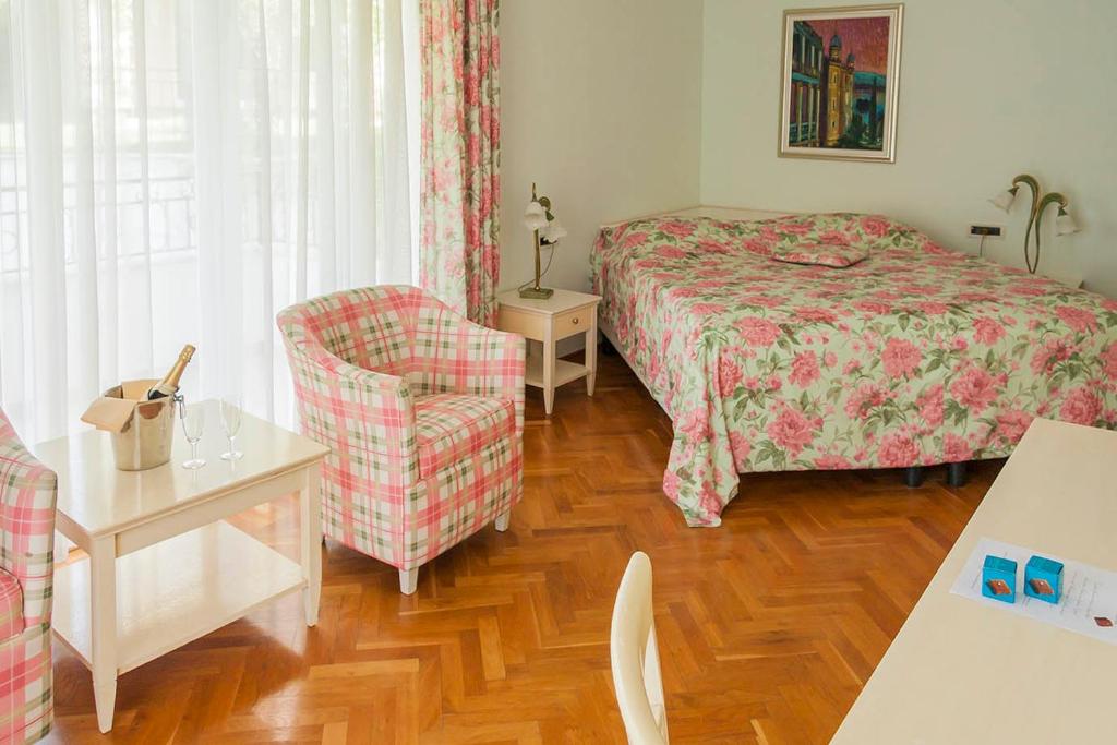 Postel nebo postele na pokoji v ubytování Hotel Miramar