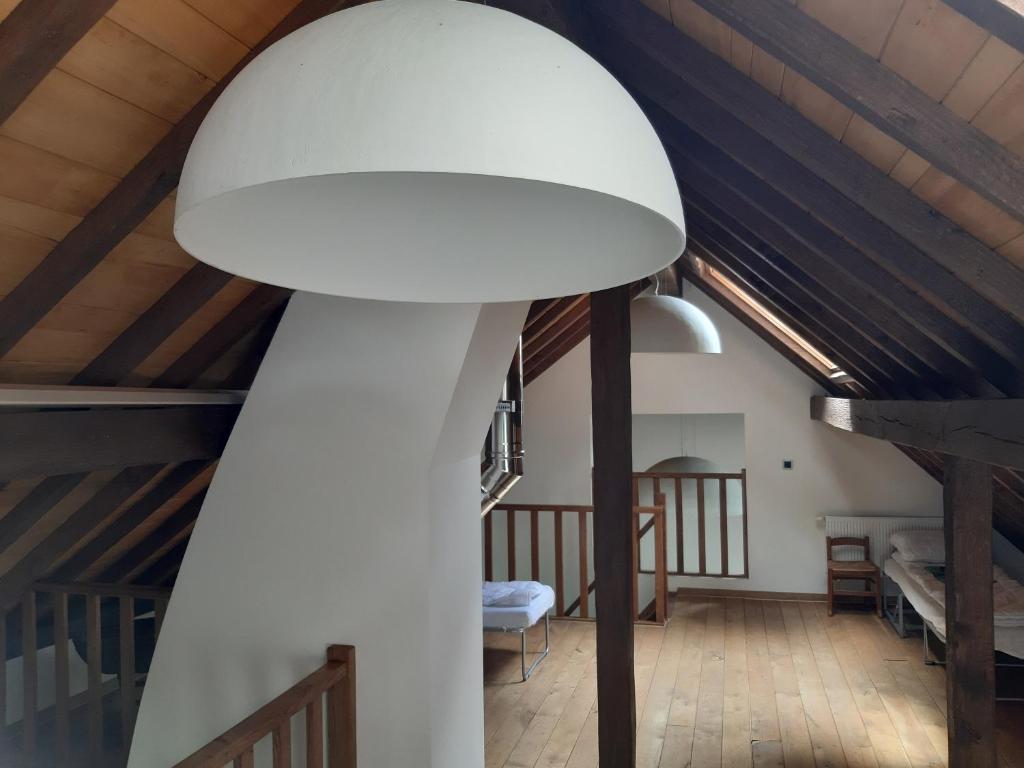 Postel nebo postele na pokoji v ubytování Lemen huis Houwaart