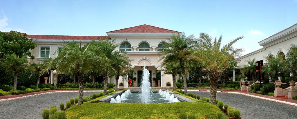 Zahrada ubytování The Palms Town & Country Club - Resort