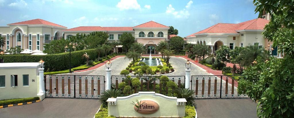 Zahrada ubytování The Palms Town & Country Club - Resort