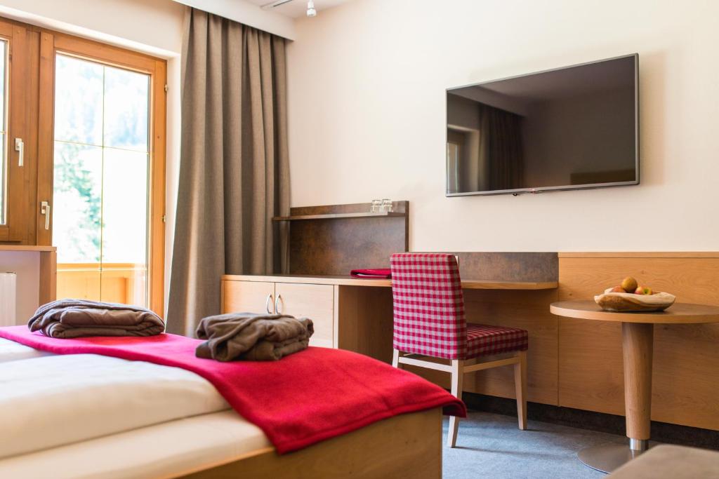 Postel nebo postele na pokoji v ubytování Hotel Eden