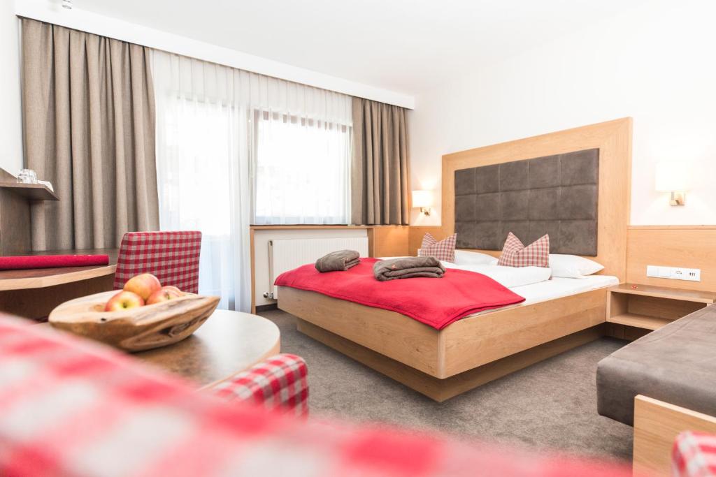 Postel nebo postele na pokoji v ubytování Hotel Eden