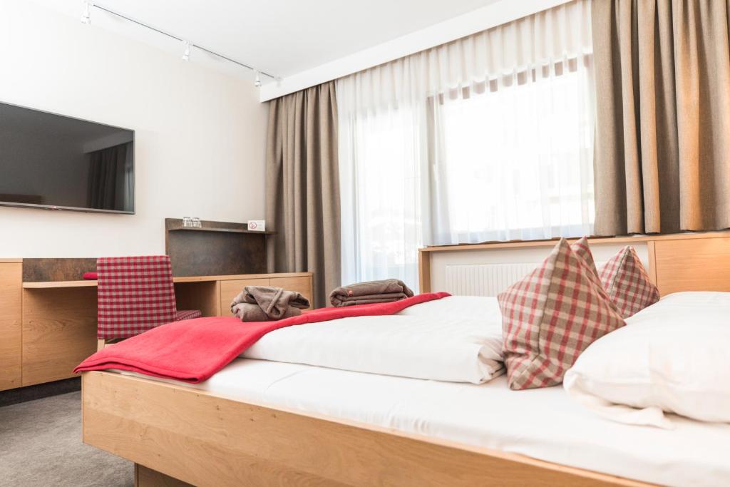 Postel nebo postele na pokoji v ubytování Hotel Eden